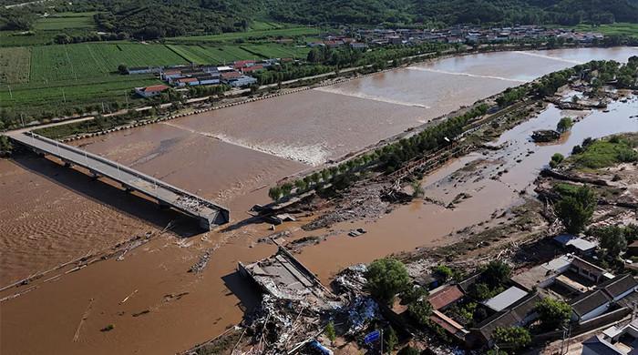 Extreme rain in China caused .2bn in road damage, further straining public purse