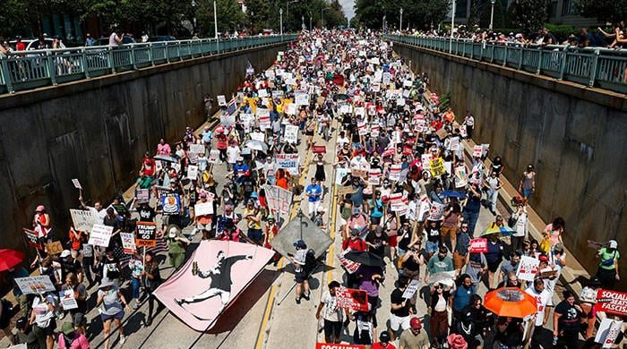 Washington DC residents protest against Trump’s troop deployment to the city Washington DC residents protest against Trump’s troop deployment to the city