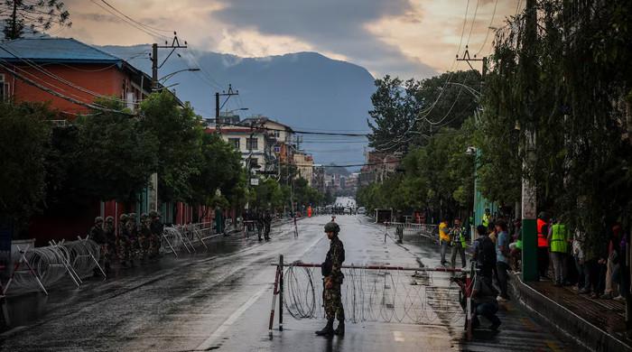 Nepal sets March elections after naming interim prime minister
