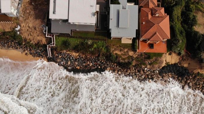 Rising oceans to threaten 1.5m Australians by 2050: report