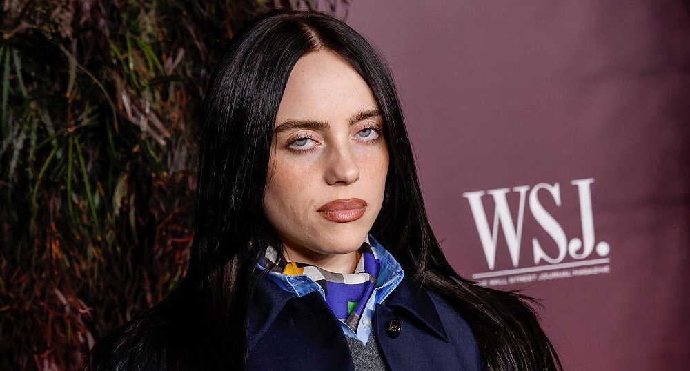 Billie Eilish calls on billionaires to donate more of their wealth: “No hate, but give your money away, shorties”