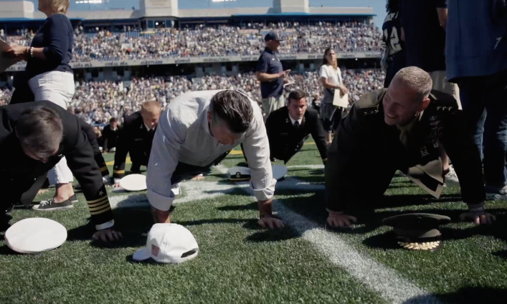 Hegseth helps set world record at Navy football game for most people doing push-ups at the same time