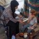 Two years after she was pictured in grief, Gaza woman faces more misery