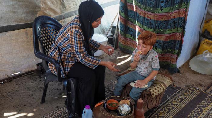 Two years after she was pictured in grief, Gaza woman faces more misery