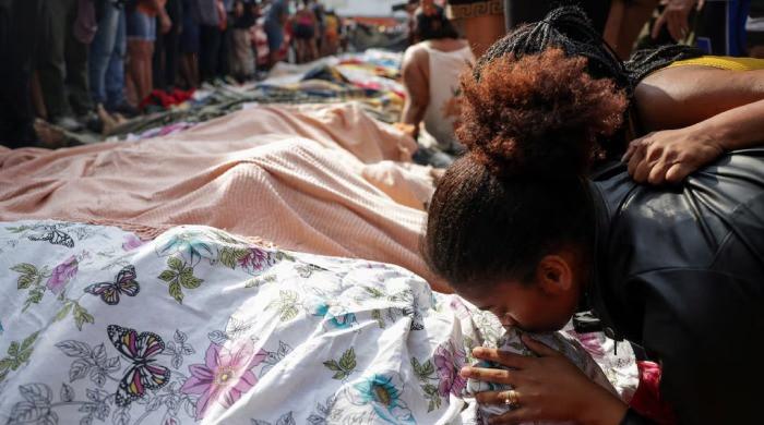 Corpses line Rio street, pushing death toll from police raids to 132 Corpses line Rio street, pushing death toll from police raids to 132