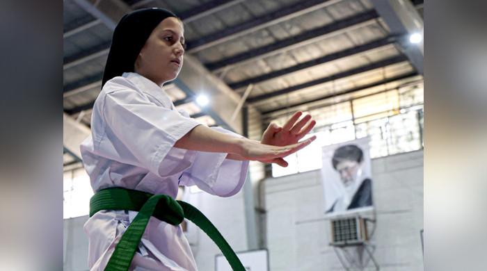 Iran girls kick down social barriers with karate
