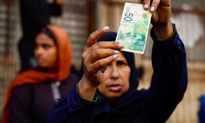 As guns fall silent, Gazans find newly reopened banks with no cash