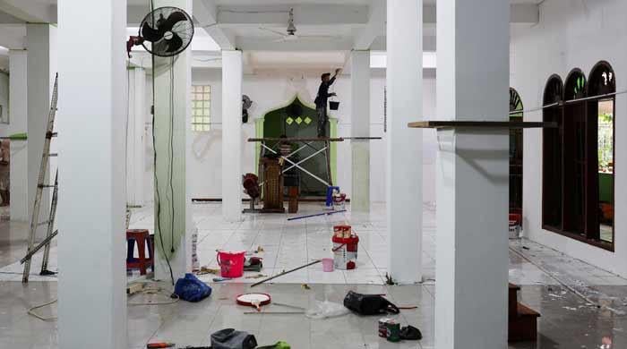 Indonesia probes student after nearly 100 hurt in school blasts