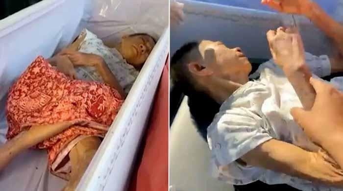 Thai woman found alive in coffin moments before cremation