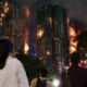 Fire engulfs Hong Kong residential blocks, killing at least 13