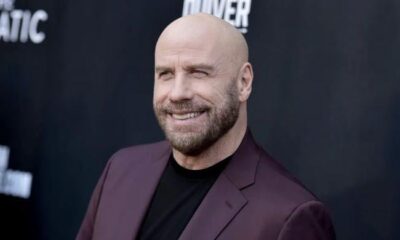 John Travolta gives ‘Greased Lightnin” a Santa-inspired revival