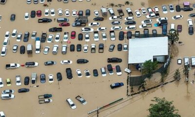 Race to get aid to Asia flood survivors as toll nears 1,200