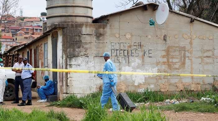 12 people, including 3 children, killed in South Africa hostel shooting