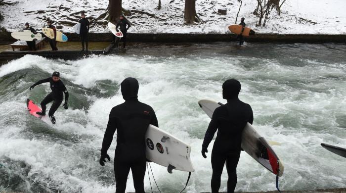 Row deepens over vanished river wave in Munich