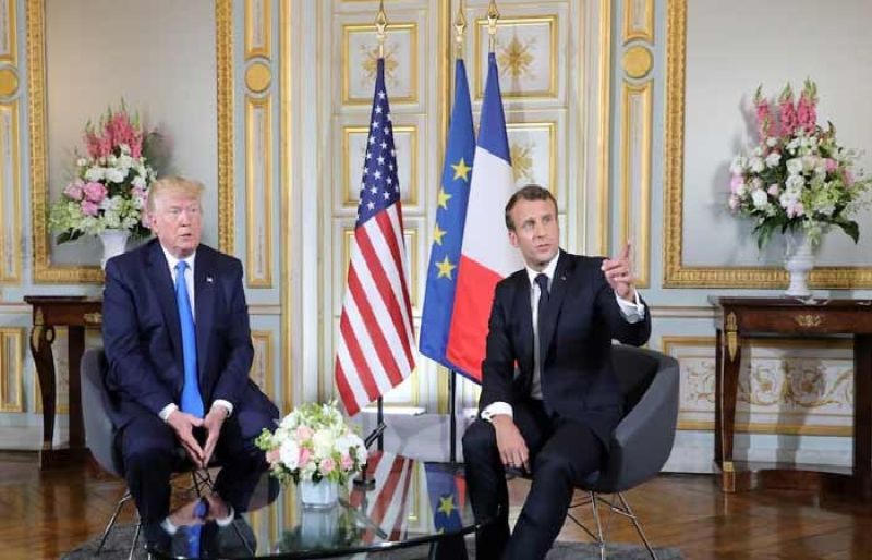 ‘We don’t give in to bullies’, Macron says after Trump salvo