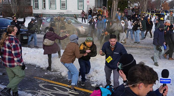 Outrage grows after ICE officer kills woman in Minneapolis