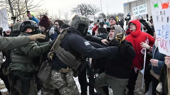 Minneapolis asks to join probe into woman’s killing by immigration officer