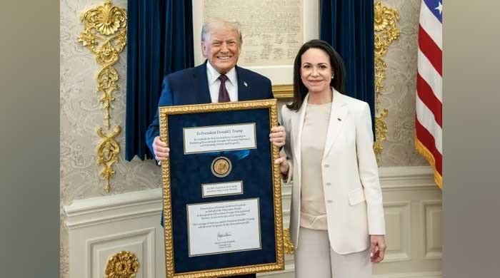 Trump accepts Nobel medal from Venezuelan opposition leader Machado