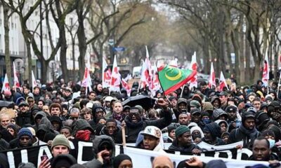 Thousands protest in Paris over death of migrant worker