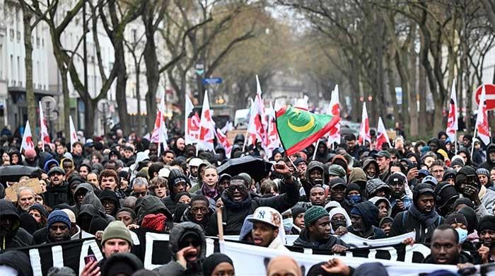 Thousands protest in Paris over death of migrant worker