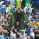 Lightning strike injures almost 100 at rally for Brazil’s former president