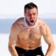 Austrian snowboarder strips down in cold temperatures during wild celebration after winning Olympic gold