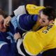 NHL outdoor game sees its 1st goalie fight between Vasilevskiy, Swayman