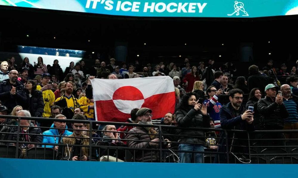 Olympic hockey fans raise Greenland’s flag during USA’s dominant win over Denmark, sparking viral reaction