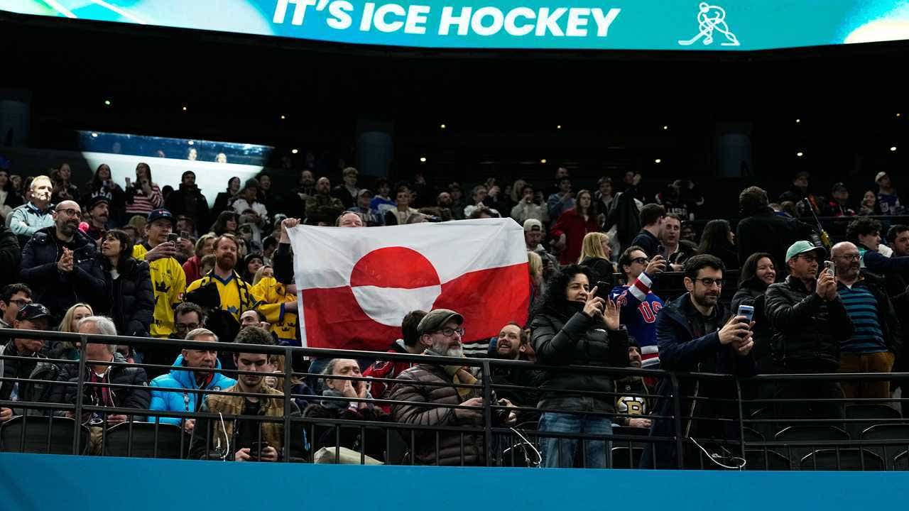 Olympic hockey fans raise Greenland’s flag during USA’s dominant win over Denmark, sparking viral reaction