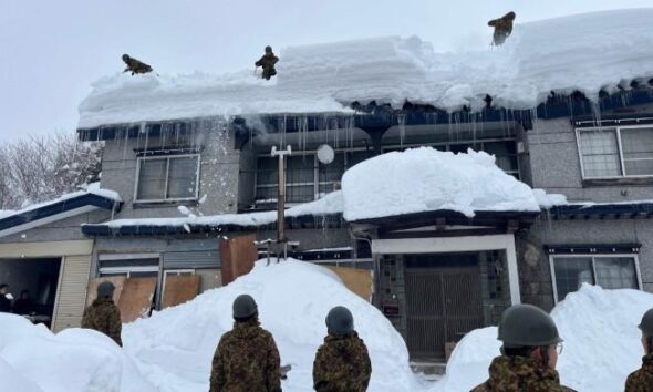 Japan warns of avalanches as snow deaths rise to 35