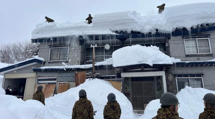 Japan warns of avalanches as snow deaths rise to 35