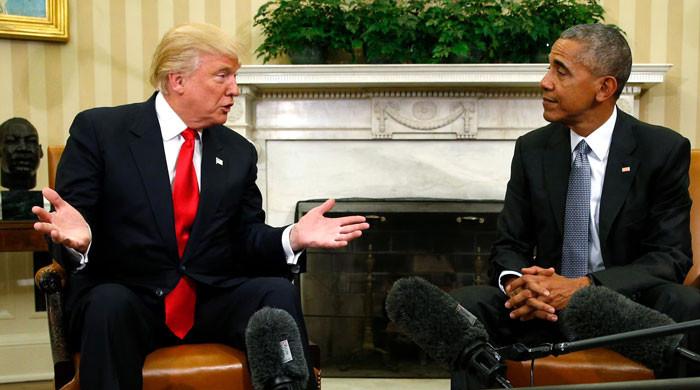 Fury after Trump posts video of Obamas as monkeys