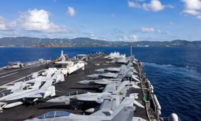 US to deploy new aircraft carrier to Middle East as Trump warns Iran