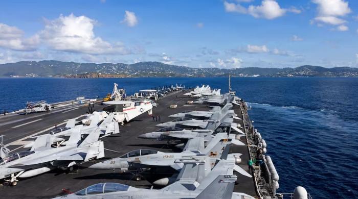 US to deploy new aircraft carrier to Middle East as Trump warns Iran