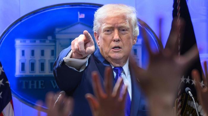 Trump says he will raise US global tariff rate from 10% to 15%, following court ruling