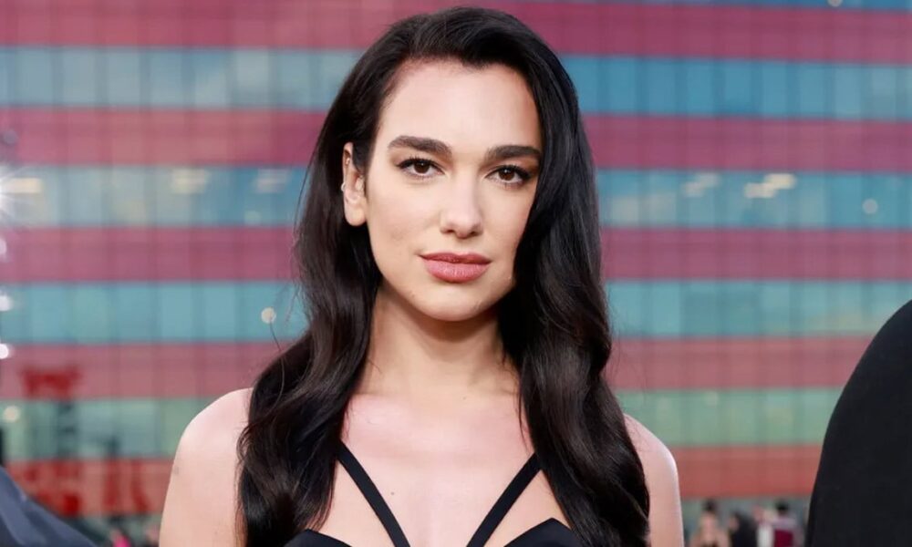 Dua Lipa pouts with director pal after locking major deal
