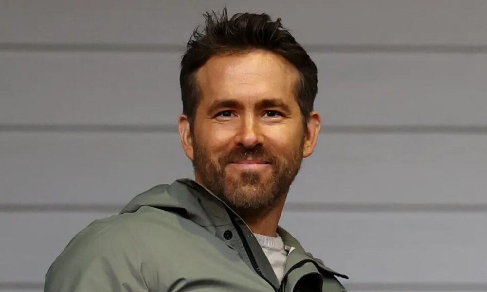 Fans make Ryan Reynolds bid k for hat at auction