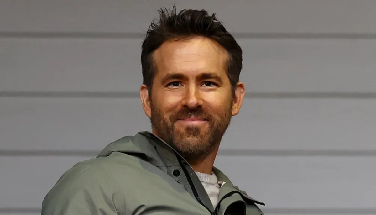 Fans make Ryan Reynolds bid k for hat at auction