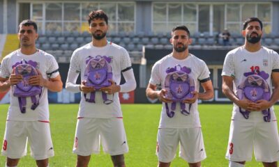 Iran’s soccer team honors victims of elementary school airstrike