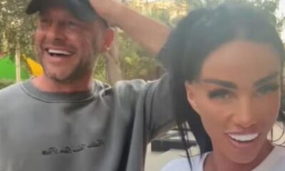 Katie Price laughs off pregnancy claims as Lee Andrews remains overseas