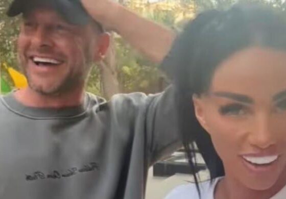 Katie Price laughs off pregnancy claims as Lee Andrews remains overseas
