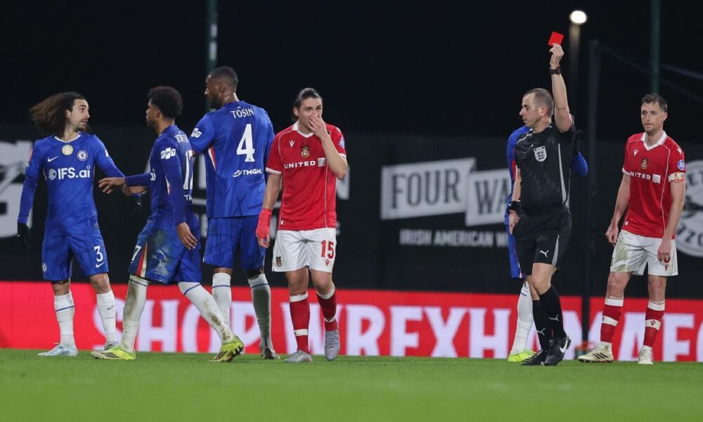 VAR review: Why was Wrexham’s Dobson sent off for his challenge on Garnacho?