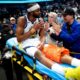Warriors’ Moses Moody leaves game on stretcher after suffering gruesome injury on dunk attempt