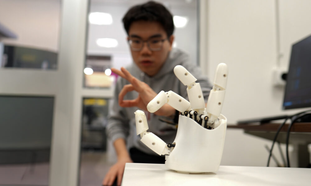 Wristband enables wearers to control a robotic hand with their own movements