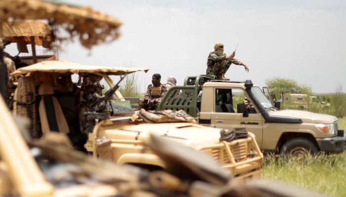Gunmen stage simultaneous attacks in and outside Mali capital, says army