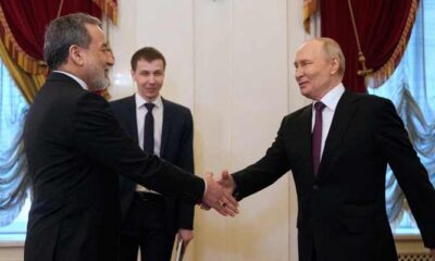 In meeting with Iranian FM, Putin pledges support for Iran