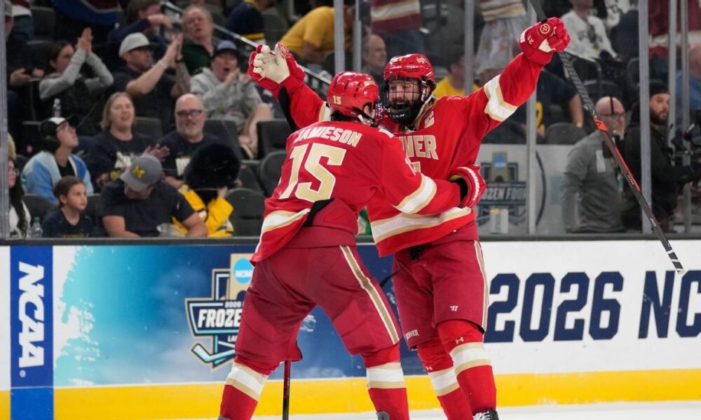 Denver stuns Michigan in 2OT, plays Wisconsin for Frozen Four title