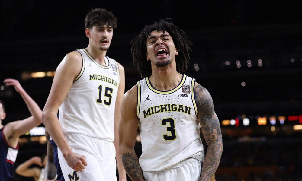 Michigan holds off UConn to capture first men’s basketball national title since 1989