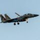 Iran downs warplane, launches missile strikes on Israel