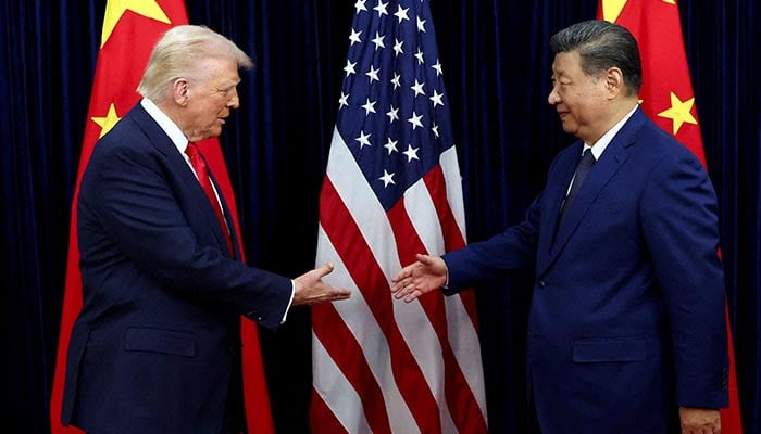 Trump vows to push Xi to ‘open up’ China at superpower summit